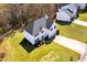 Charming two-story home with landscaped yard, driveway and a two-car garage at 6675 Princeton Park Ct, Lithonia, GA 30058