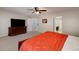 Large bedroom with a TV and en-suite bathroom at 6675 Princeton Park Ct, Lithonia, GA 30058