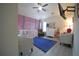 A cozy Bedroom with vaulted ceilings, charming décor, and soft, inviting colors at 9348 Lantana Trl, Jonesboro, GA 30238