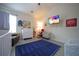 Bright Bedroom featuring a vaulted ceiling, soft colors, and a cozy atmosphere at 9348 Lantana Trl, Jonesboro, GA 30238