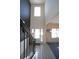 Grand two-story foyer with abundant natural light and modern finishes at 9348 Lantana Trl, Jonesboro, GA 30238
