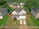Inviting two-story home with a well-manicured front yard and a two-car garage, perfect for Gathering living at 9348 Lantana Trl, Jonesboro, GA 30238