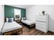 Charming bedroom with two twin beds, natural light, and ample closet space at 1377 Marston St, Smyrna, GA 30080