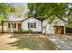 Charming single-story home featuring a newly paved driveway and inviting front porch at 1377 Marston St, Smyrna, GA 30080