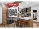 Modern kitchen with a stylish center island, stainless appliances, and wooden accents at 1377 Marston St, Smyrna, GA 30080