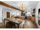 Spacious kitchen with stainless steel appliances, wooden cabinets, and an inviting dining area at 1377 Marston St, Smyrna, GA 30080