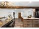 Bright, modern living room featuring stylish wood beam, hardwood floors, and open concept design at 1377 Marston St, Smyrna, GA 30080