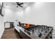 Spacious living area boasts a foosball table, sectional sofa, and kitchenette for entertaining at 1377 Marston St, Smyrna, GA 30080