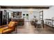 A bright open living area flows to a modern kitchen with wooden beams and stainless appliances at 1377 Marston St, Smyrna, GA 30080