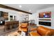 Bright open living space with a modern kitchen, dining area, and stylish furnishings at 1377 Marston St, Smyrna, GA 30080