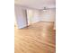 Large bedroom featuring wood-look floors, ceiling fan and lots of natural light at 2302 Waldrop Pl, Decatur, GA 30034