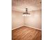 Open-concept dining room featuring wood-look floors and a modern chandelier at 2302 Waldrop Pl, Decatur, GA 30034