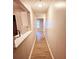 Long hallway featuring wood-look floors, leading into the other rooms at 2302 Waldrop Pl, Decatur, GA 30034