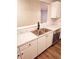 Modern kitchen featuring stainless steel appliances, white cabinets and modern countertops at 2302 Waldrop Pl, Decatur, GA 30034