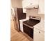 Modern kitchen featuring stainless steel appliances, white cabinets and updated countertops at 2302 Waldrop Pl, Decatur, GA 30034