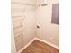 Dedicated laundry room featuring white wire shelving for storage at 2302 Waldrop Pl, Decatur, GA 30034