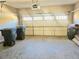 Spacious garage with an automatic door and natural light at 2478 Brynfield Cv, Suwanee, GA 30024