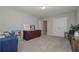 Spacious bonus room offers versatile staging options, neutral walls, and double door closet for flexible living at 2871 Fareed, Douglasville, GA 30135
