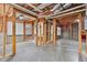 Unfinished basement with exposed framing, concrete floor and window at 3311 Fieldwood Se Dr, Smyrna, GA 30080