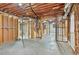 Unfinished basement with exposed framing and concrete floor at 3311 Fieldwood Se Dr, Smyrna, GA 30080