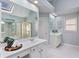 Bathroom features a separate shower and tub with an extended vanity with dual sinks at 3311 Fieldwood Se Dr, Smyrna, GA 30080