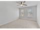 Bright bedroom has a ceiling fan and two windows allowing for plenty of natural light at 3311 Fieldwood Se Dr, Smyrna, GA 30080