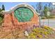 Community entrance sign amidst colorful landscaping and blooming flowers, creating a welcoming atmosphere at 3311 Fieldwood Se Dr, Smyrna, GA 30080