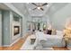 Spacious primary bedroom suite features hardwood floors, a fireplace, and tray ceilings at 3311 Fieldwood Se Dr, Smyrna, GA 30080