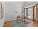 Cozy home office with hardwood floors, natural light, and elegant window coverings at 3311 Fieldwood Se Dr, Smyrna, GA 30080