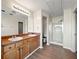 Bright bathroom featuring double sink vanity and glass-enclosed shower at 5538 Cascade Sw Rdg, Atlanta, GA 30336