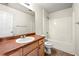 Well lit bathroom features a shower-tub combination at 5538 Cascade Sw Rdg, Atlanta, GA 30336