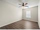 Bright bedroom features include a ceiling fan and beautiful laminate flooring at 5538 Cascade Sw Rdg, Atlanta, GA 30336