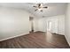 Spacious bedroom boasts ample natural light and laminate flooring at 5538 Cascade Sw Rdg, Atlanta, GA 30336