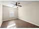 Bright bedroom features include a ceiling fan and beautiful laminate flooring at 5538 Cascade Sw Rdg, Atlanta, GA 30336