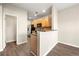 Efficient kitchen with wood cabinets, stainless steel appliances, and laminate flooring at 5538 Cascade Sw Rdg, Atlanta, GA 30336