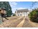 Large backyard with playset and expansive lawn space for outdoor enjoyment, offering privacy and room at 675 Timber Ives Dr, Dacula, GA 30019