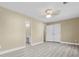 Spacious bedroom with ensuite bathroom and closet featuring updated flooring and fixtures at 675 Timber Ives Dr, Dacula, GA 30019