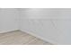 Walk-in closet with laminate floors and wire shelving for organized storage at 675 Timber Ives Dr, Dacula, GA 30019