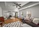 Spacious living room boasts abundant natural light, hardwood floors and comfortable seating area at 2115 Azalea Dr, Roswell, GA 30075