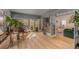 Sunlit living room featuring hardwood floors, large windows, and an open layout perfect for entertaining at 2115 Azalea Dr, Roswell, GA 30075