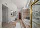 Elegant bathroom showcasing a jacuzzi tub, glass enclosed shower, and dual sink vanity at 2115 Azalea Dr, Roswell, GA 30075