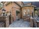 Charming backyard brick entry steps up to a patio at 9185 Old Southwick Pass, Johns Creek, GA 30022