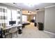 Expansive main bedroom suite featuring a desk, sitting area, carpeted floors and windows at 1023 Hawk Creek Trl, Lawrenceville, GA 30043