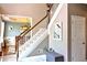 Elegant staircase leading to the upper level at 1023 Hawk Creek Trl, Lawrenceville, GA 30043