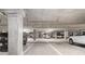 Underground parking garage with clearly marked spaces and ample lighting at 1065 Peachtree Ne St # 2901, Atlanta, GA 30309