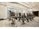 Well-equipped fitness center with various machines and natural light at 1065 Peachtree Ne St # 2901, Atlanta, GA 30309