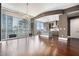 Bright and airy living room featuring floor to ceiling windows and hardwood floors at 1065 Peachtree Ne St # 2901, Atlanta, GA 30309