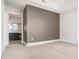 Main bedroom featuring a bathroom, carpeted floor, and neutral-colored walls at 1065 Peachtree Ne St # 2901, Atlanta, GA 30309