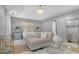 Elegant main bedroom featuring a cozy chaise lounge and stylish decor at 120 Sunflower Ln, Covington, GA 30016