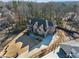 Aerial view of a brick home with a private yard, showcasing the property's layout and landscaping at 2417 Siesta Ct, Marietta, GA 30062